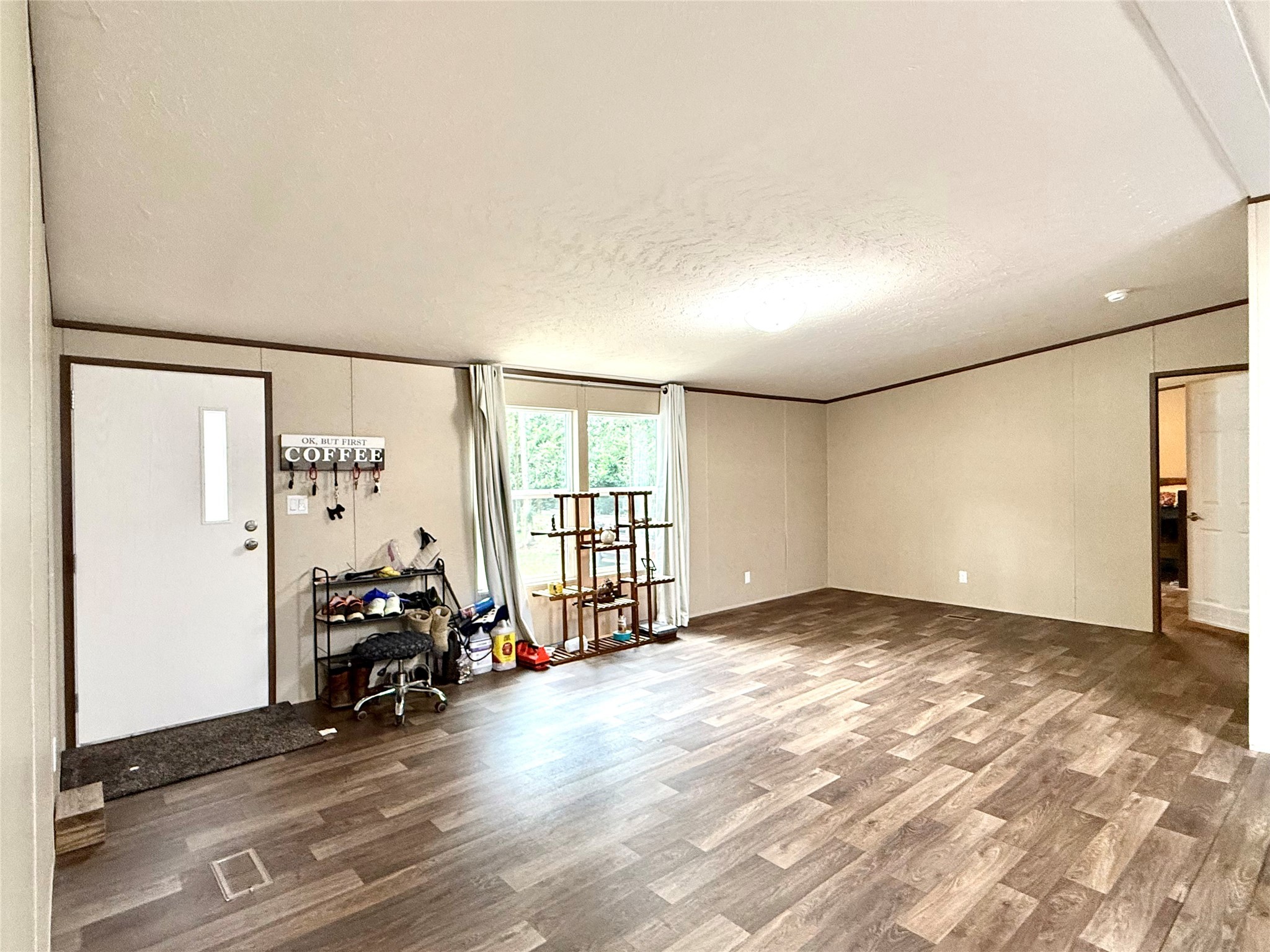 17008 FM 1484 Road Conroe, TX 77303 - Photo 4 of 36 a view of a livingroom with furniture and a window