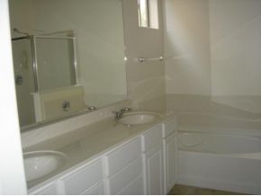 4785 Edgemont Road Prescott Valley, AZ 86314 - Photo 4 of 9 a bathroom with a tub and shower