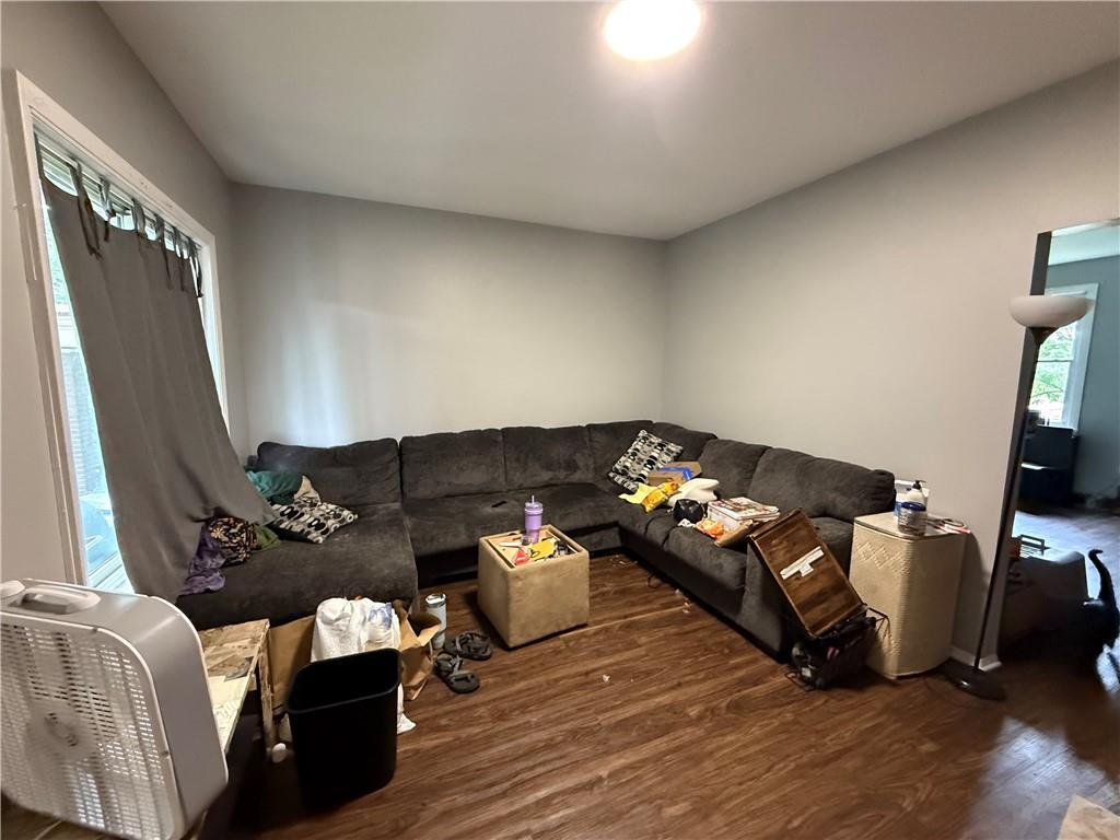 1336 Complete Street Pittsburgh, PA 15212 - Photo 3 of 14 a living room with furniture fireplace and flat screen tv