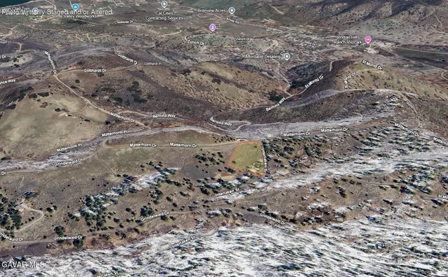 a view of water covered by side of a road
