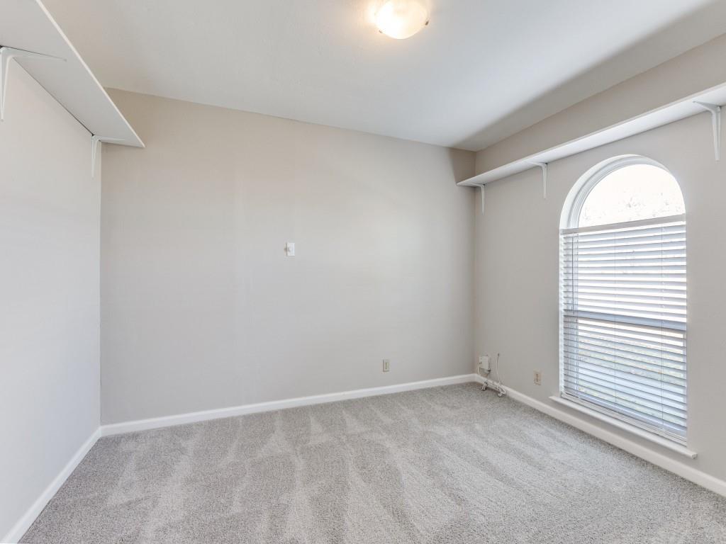 7335 Reed Road Azle, TX 76020 - Photo 15 of 36 an empty room with a window