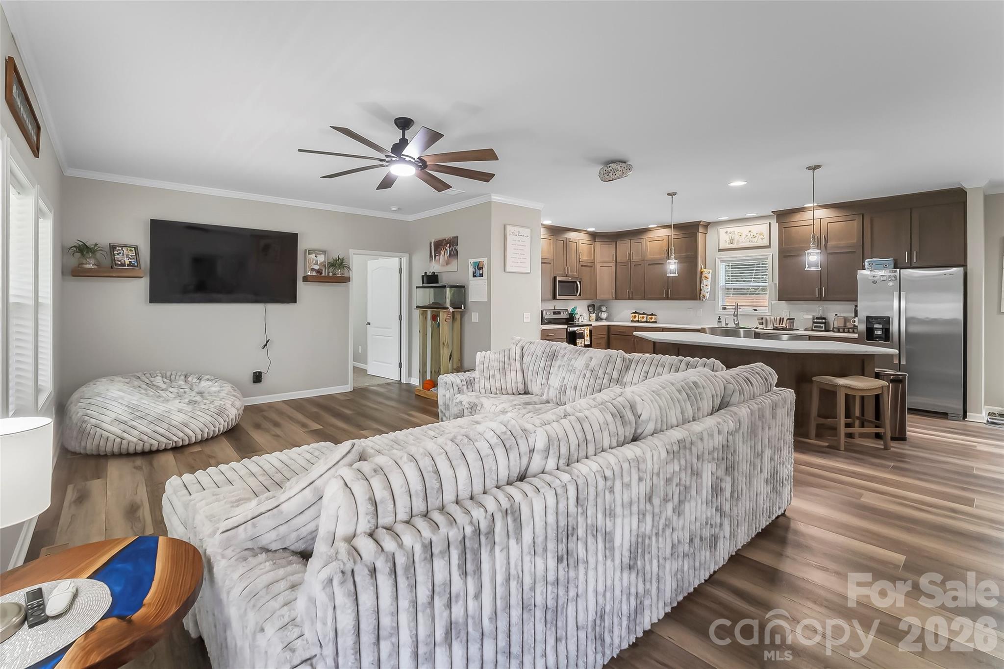 3511 Randleman Road Iron Station, NC 28080 - Photo 5 of 31 a living room with furniture and a flat screen tv