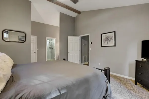 a view of a livingroom with furniture and a window