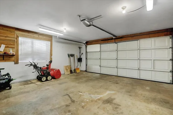 a bathroom with a sink toilet tub and shower