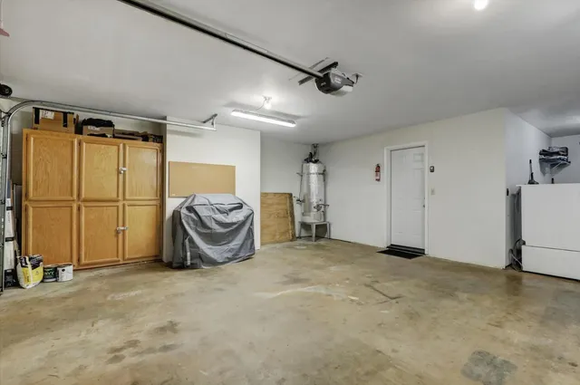 a bathroom with a shower and a toilet