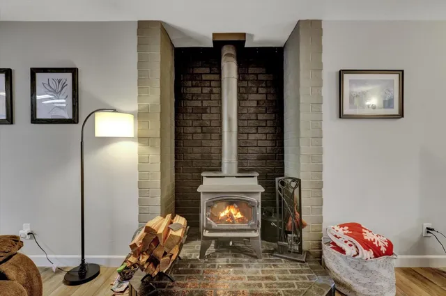 a stove top oven sitting inside of a kitchen