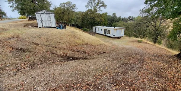 a view of a barn with a yard