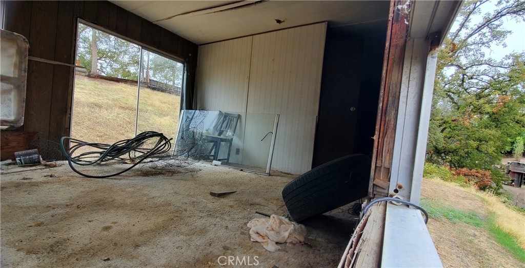 7126 Coyote Point Corning, CA 96021 - Photo 17 of 18 a view of a room with gym equipment