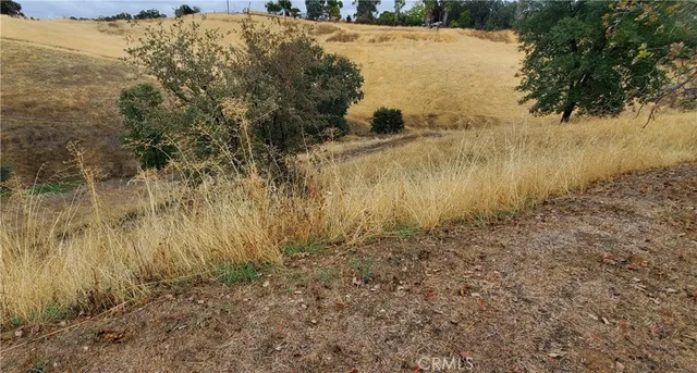 a view of a lake with mountain in the background