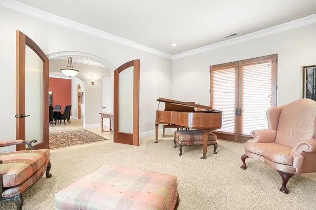 a kitchen with granite countertop a stove and a refrigerator