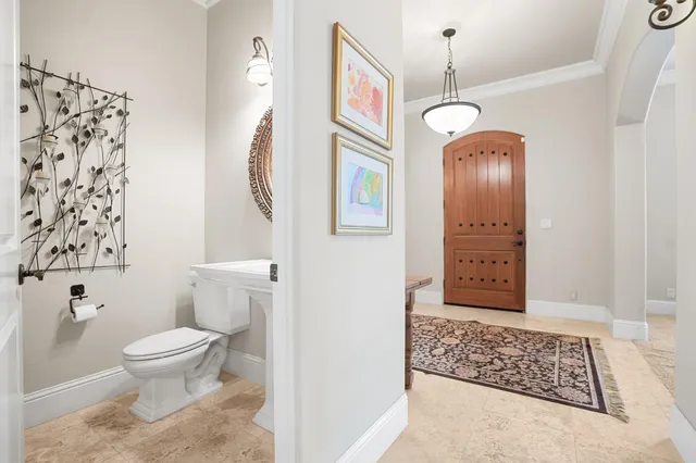 a kitchen with stainless steel appliances granite countertop a stove and a refrigerator