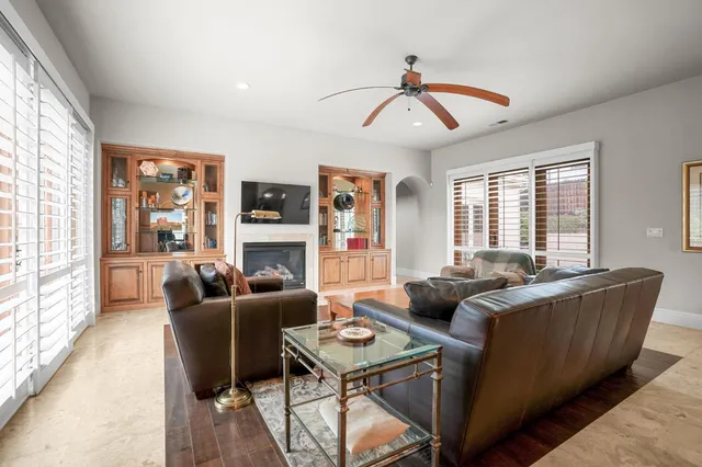a spacious bathroom with a sink and a mirror