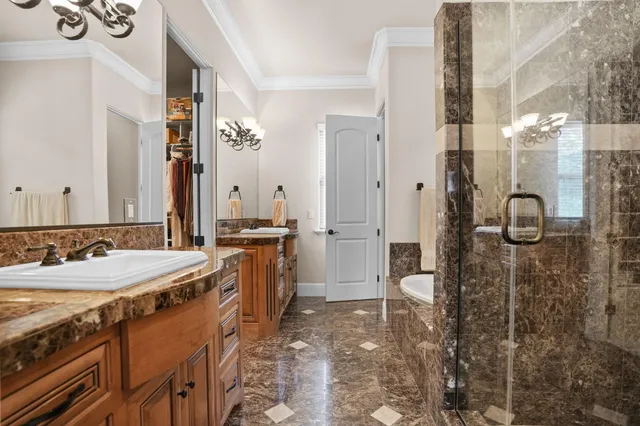 a work room with furniture and a window