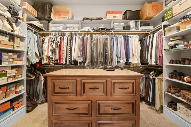 a workspace with furniture and window