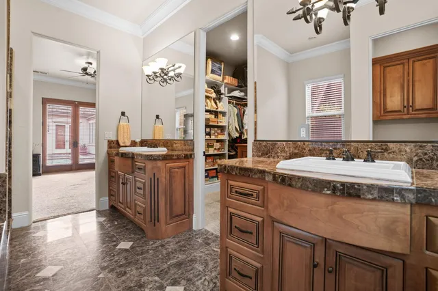 a view of a patio with couches chairs and potted plants
