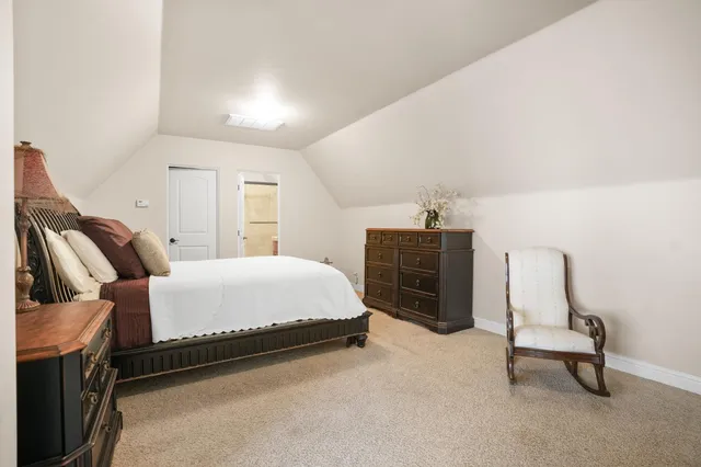 a view of a backyard with sitting area