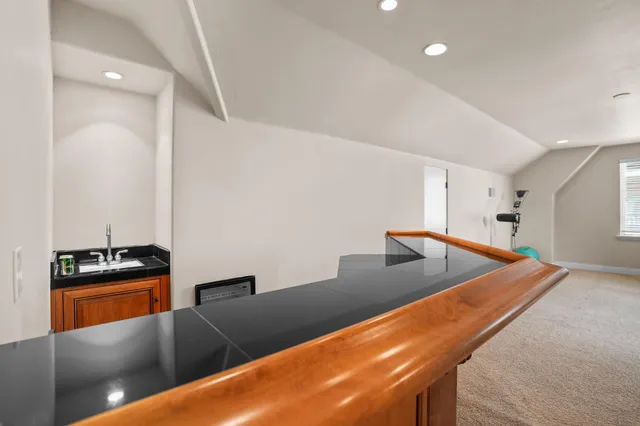 an aerial view of multiple houses with outdoor space