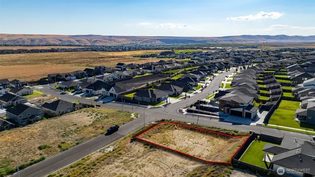 a view of a ocean with a nearby beach