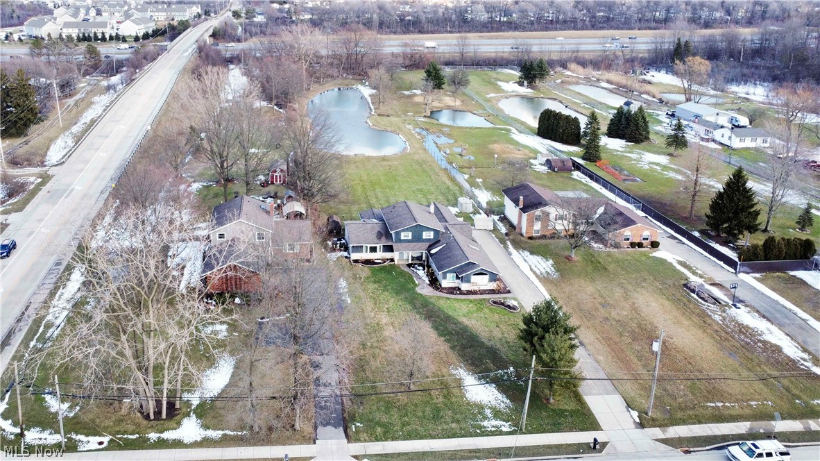 563 North Carpenter Road Brunswick, OH 44212 - Photo 37 of 45 Aerial perspective of suburban area featuring a nearby body of water