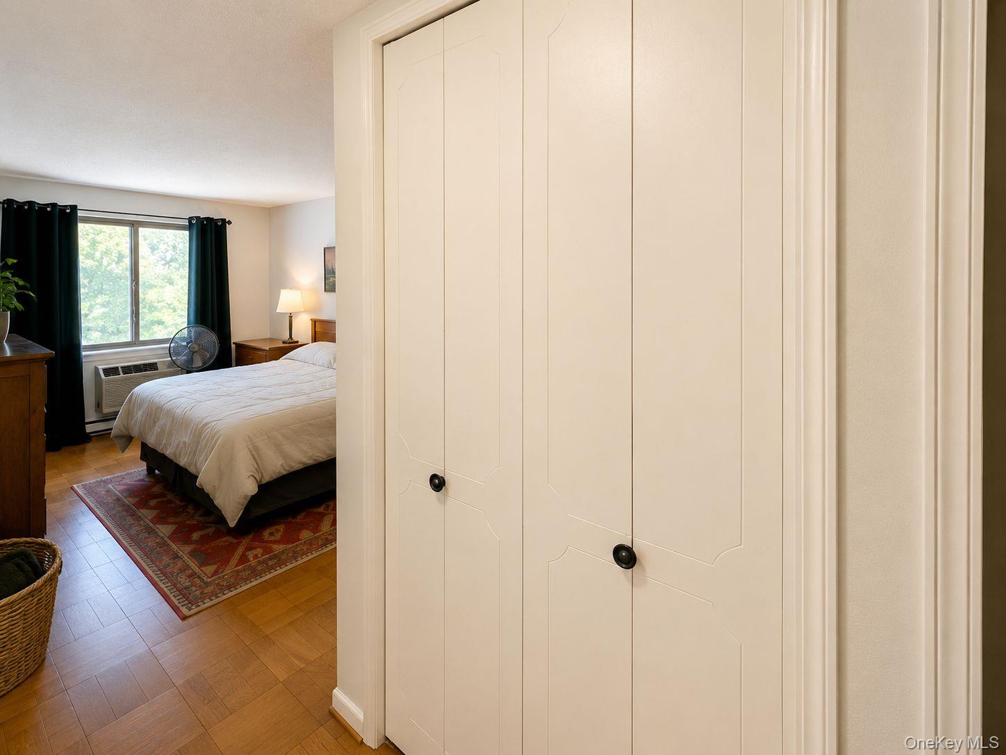 160 Academy Street, Unit 3J Poughkeepsie, NY 12601 - Photo 8 of 14 a bedroom with a bed and a window