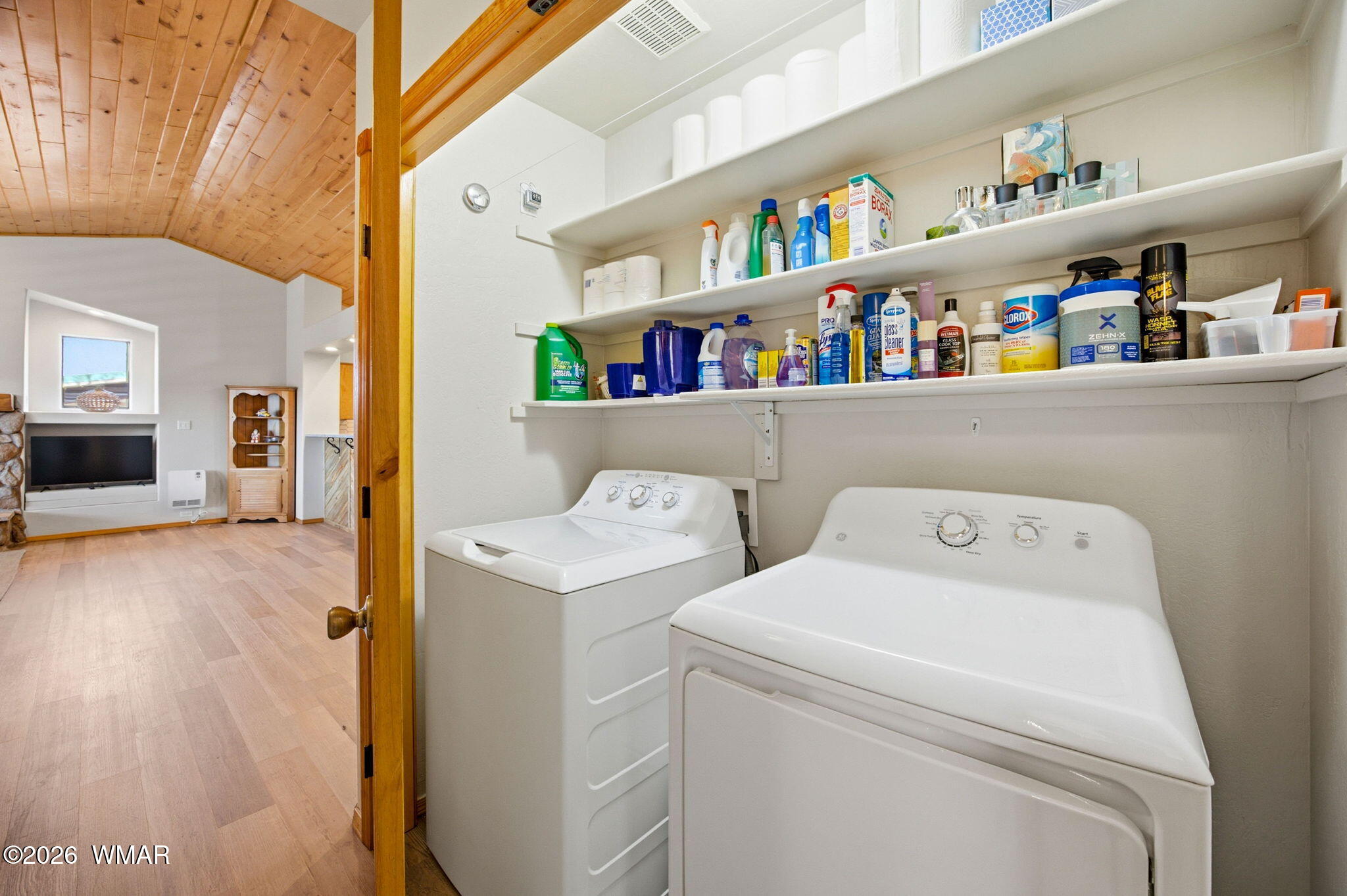 2660 Palomino Trail Overgaard, AZ 85933 - Photo 11 of 60 a storage room with washer and dryer