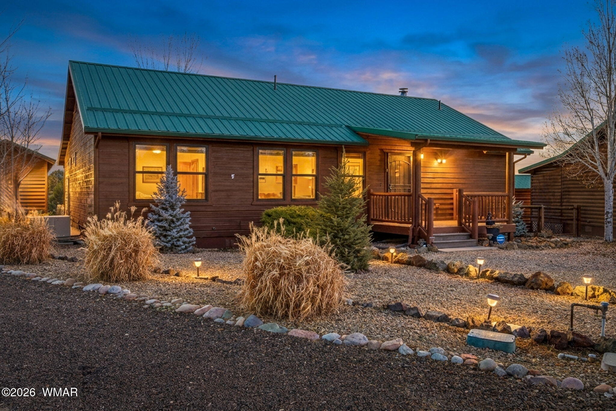 2660 Palomino Trail Overgaard, AZ 85933 - Photo 1 of 60 a front view of a house with a yard
