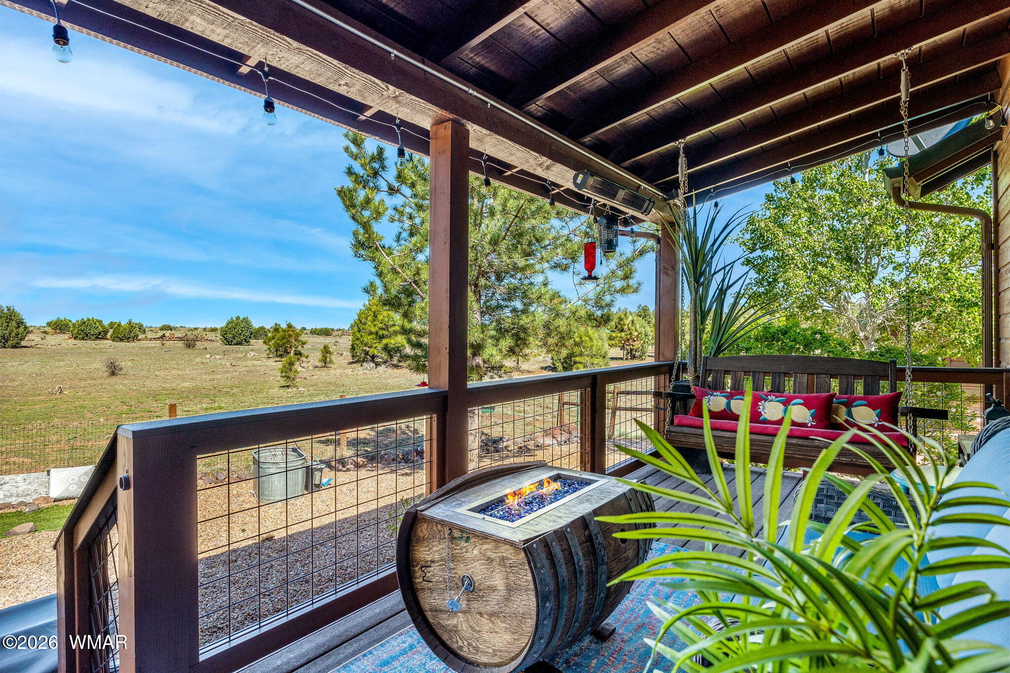 2660 Palomino Trail Overgaard, AZ 85933 - Photo 23 of 60 a view of a ocean from a balcony with furniture