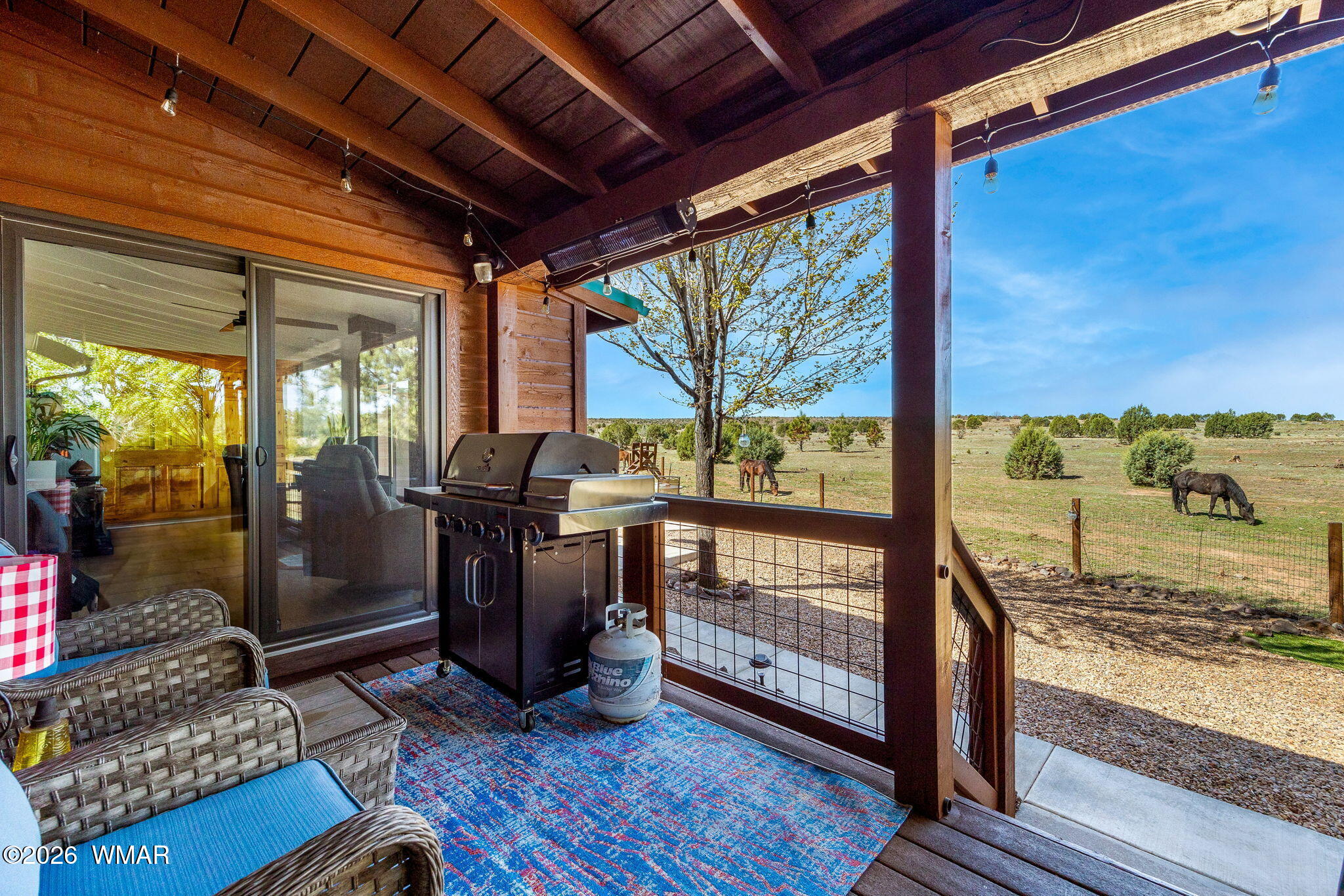 2660 Palomino Trail Overgaard, AZ 85933 - Photo 25 of 60 a view of a porch with wooden floor