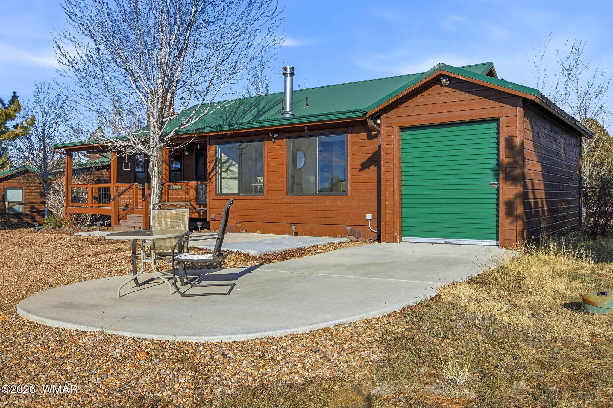 2660 Palomino Trail Overgaard, AZ 85933 - Photo 44 of 60 a front view of a house with a yard