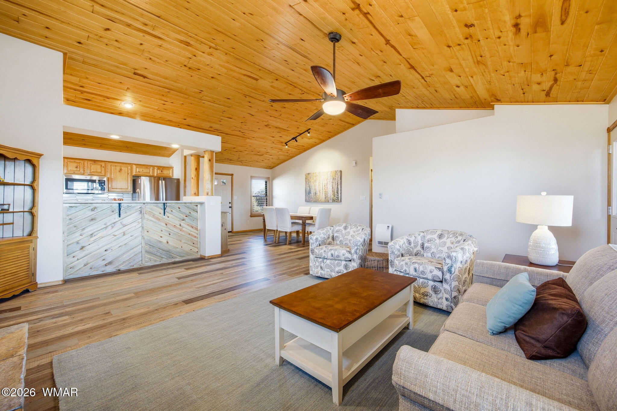 2660 Palomino Trail Overgaard, AZ 85933 - Photo 5 of 60 a living room with furniture and a table