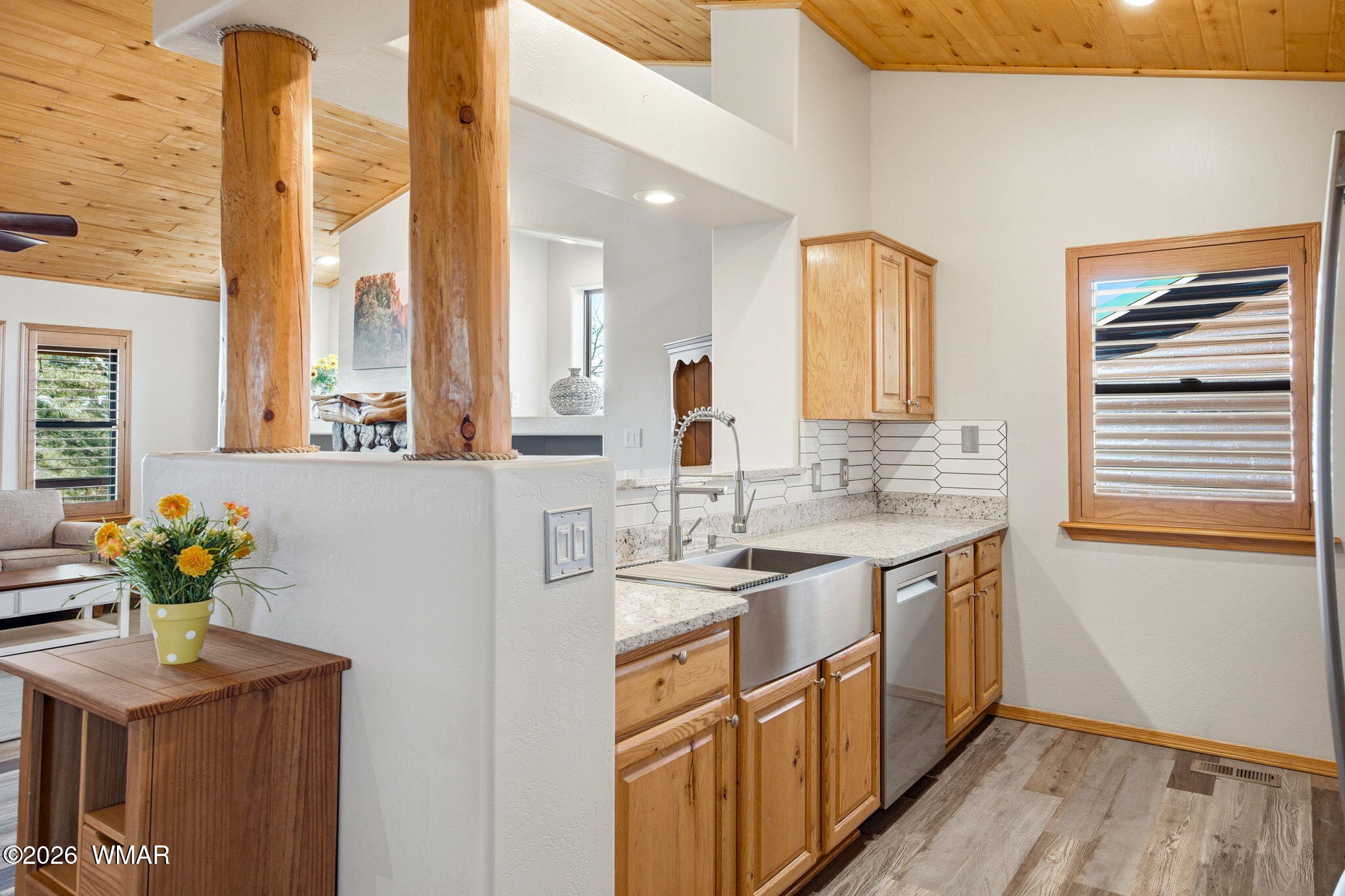 2660 Palomino Trail Overgaard, AZ 85933 - Photo 8 of 60 a kitchen with stainless steel appliances granite countertop a sink a counter space and a window