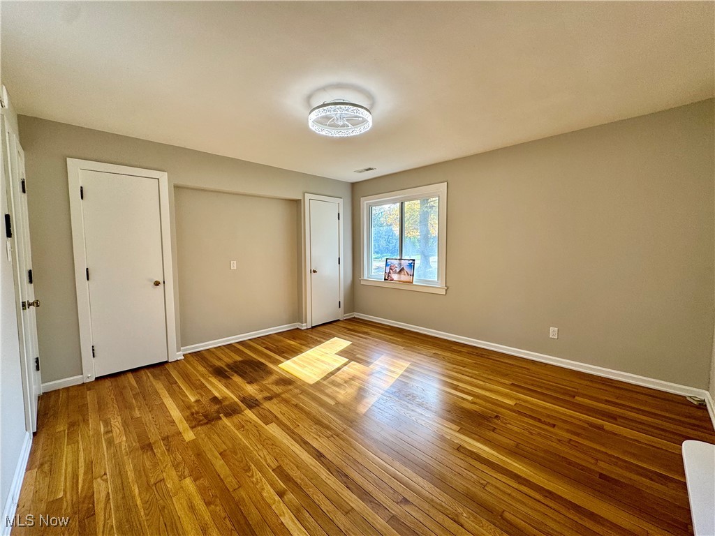 1729 East Pleasant Valley Road Independence, OH 44131 - Photo 22 of 41 Unfurnished bedroom with wood-type flooring