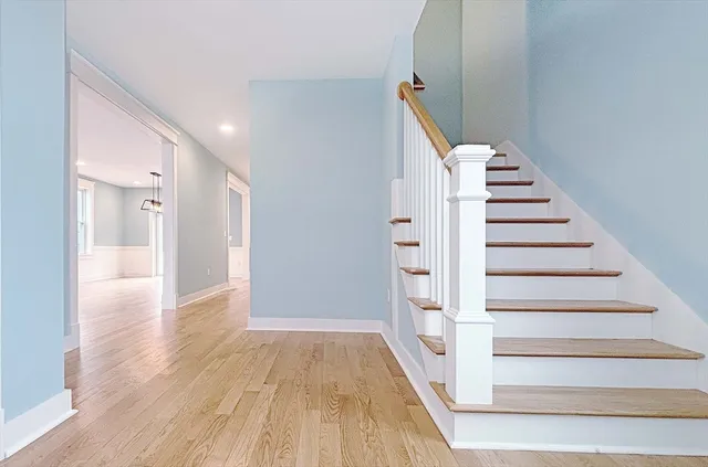 a view of entryway with wooden floor