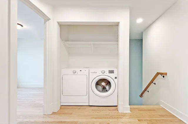 a utility room with dryer and washer