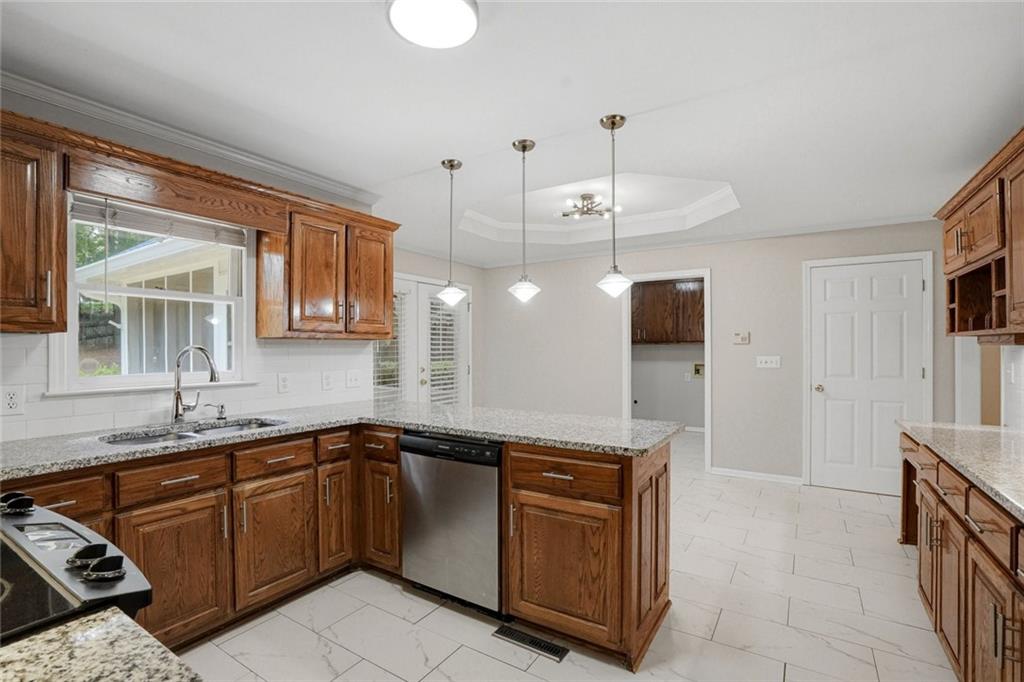 13 Bedford Ridge Northwest Cartersville, GA 30121 - Photo 5 of 19 a kitchen with a sink and cabinets