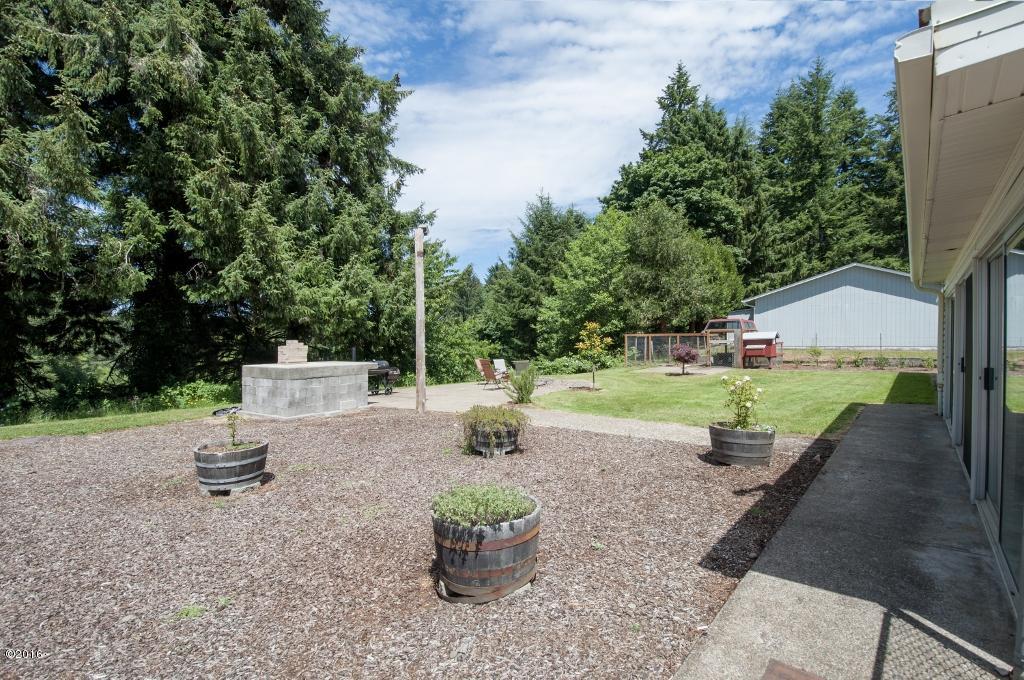 316 Old River Road Northeast Siletz, OR 97380 - Photo 32 of 37 Backyard - View 2 (1024x680)