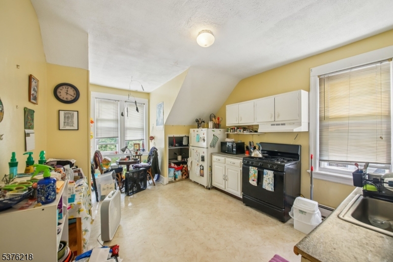 44 Oberlin Street Maplewood, NJ 07040 - Photo 18 of 31 a bed room with a bed furniture and a window
