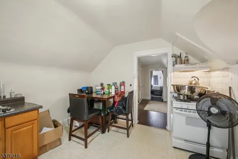 a dining room with furniture and a livingroom