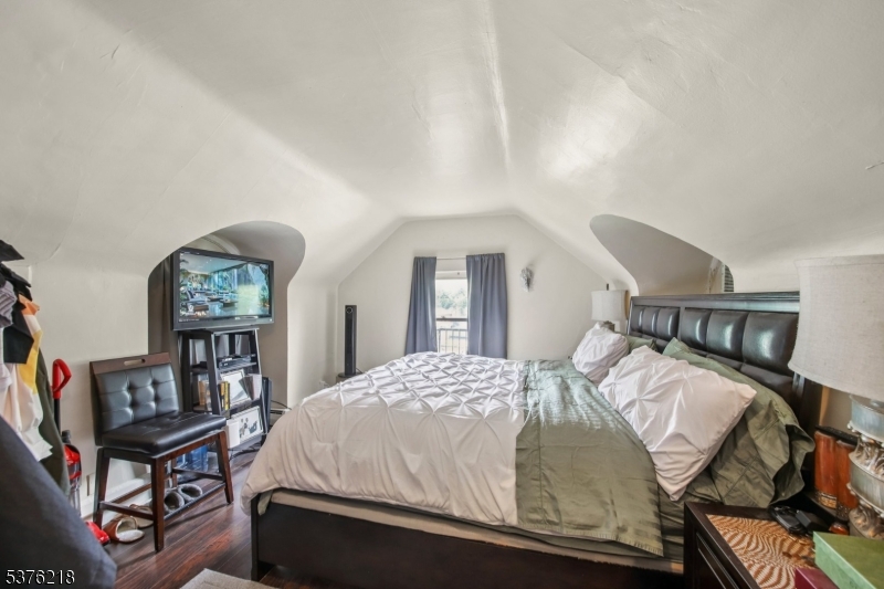 44 Oberlin Street Maplewood, NJ 07040 - Photo 24 of 31 a bedroom with a bed window and dresser
