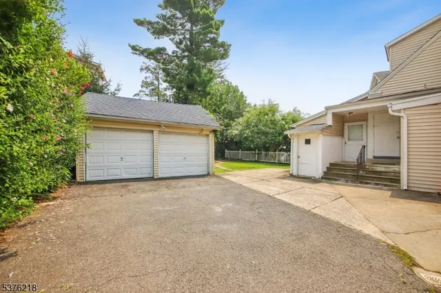 a house with trees in front of it