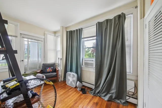 a view of a livingroom with furniture and front door