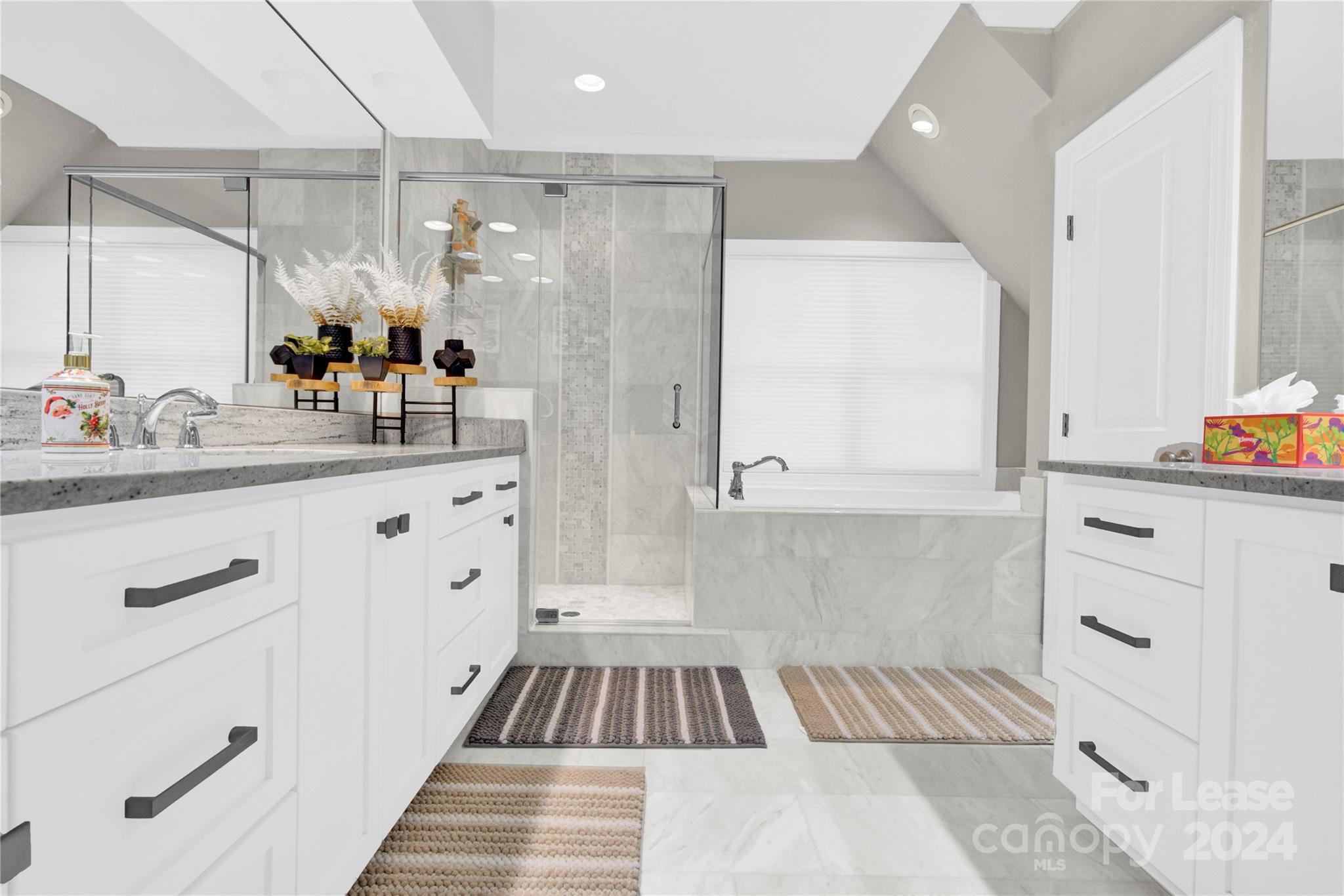 3012 Sharon View Road Charlotte, NC 28210 - Photo 19 of 48 a bathroom with a sink and a mirror