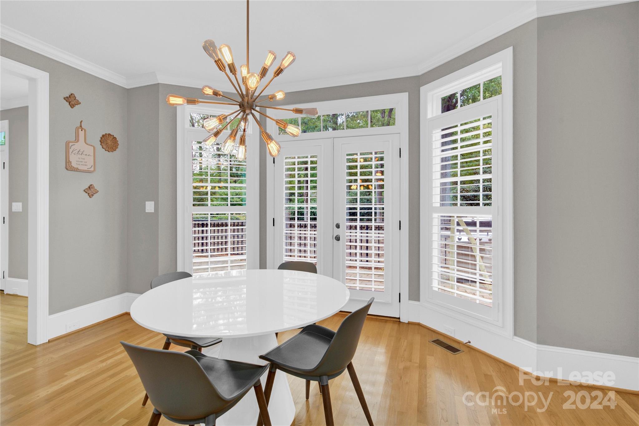 3012 Sharon View Road Charlotte, NC 28210 - Photo 28 of 48 a view of a dining room with furniture window and wooden floor