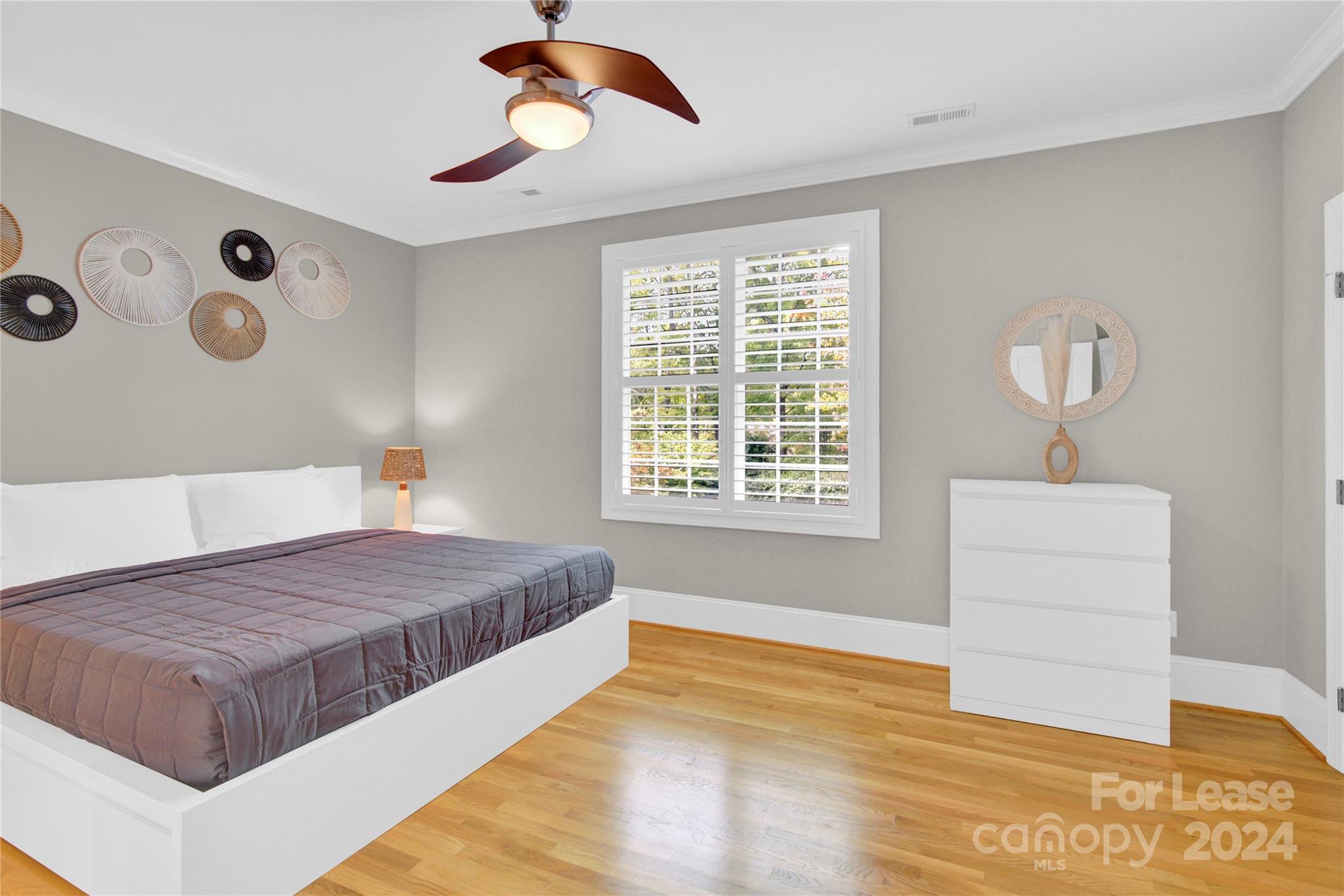 3012 Sharon View Road Charlotte, NC 28210 - Photo 43 of 48 a spacious bedroom with a bed and a dresser