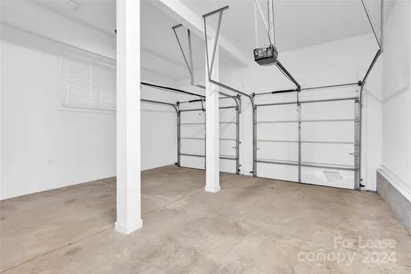 an empty room with white walls