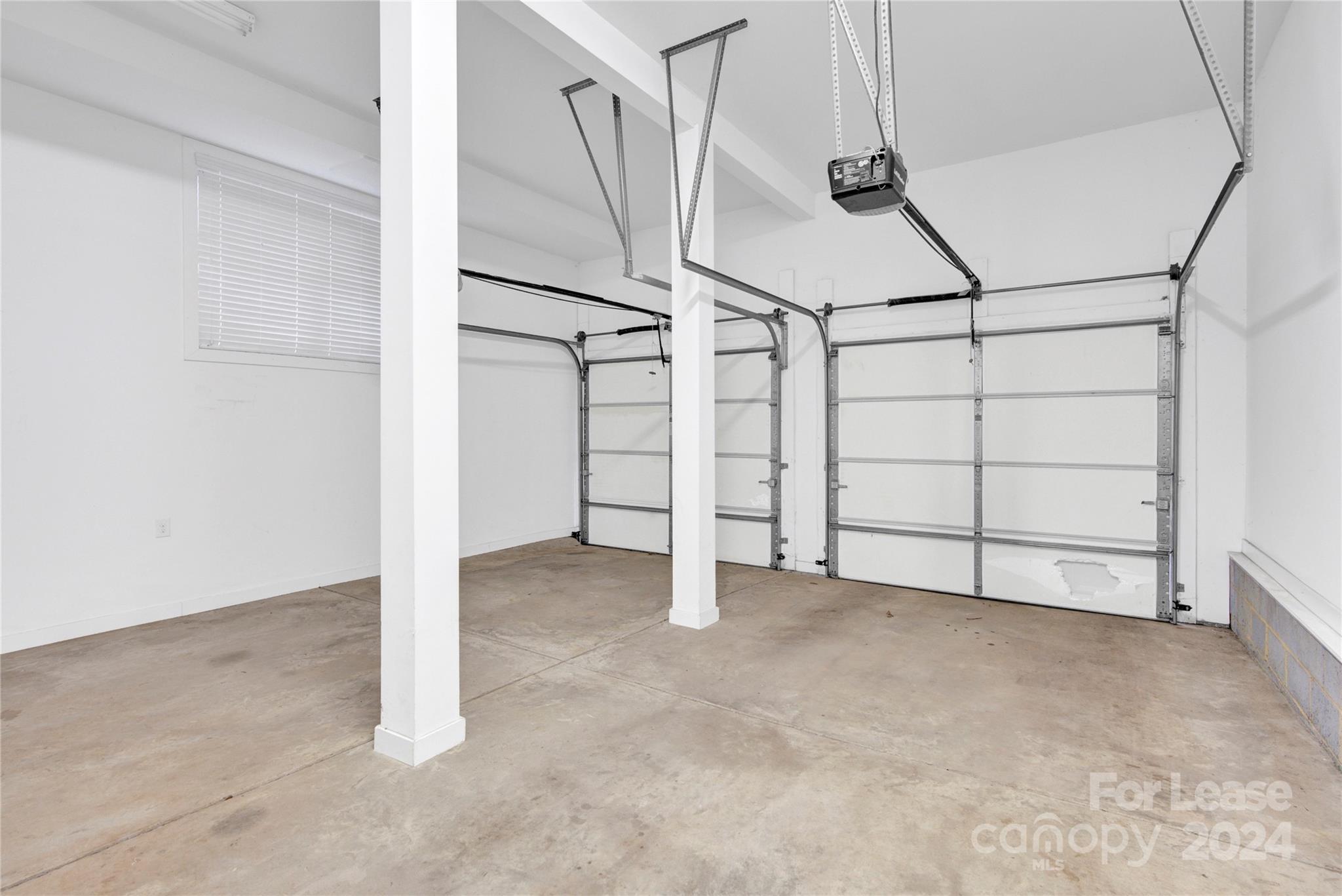 3012 Sharon View Road Charlotte, NC 28210 - Photo 6 of 48 an empty room with white walls