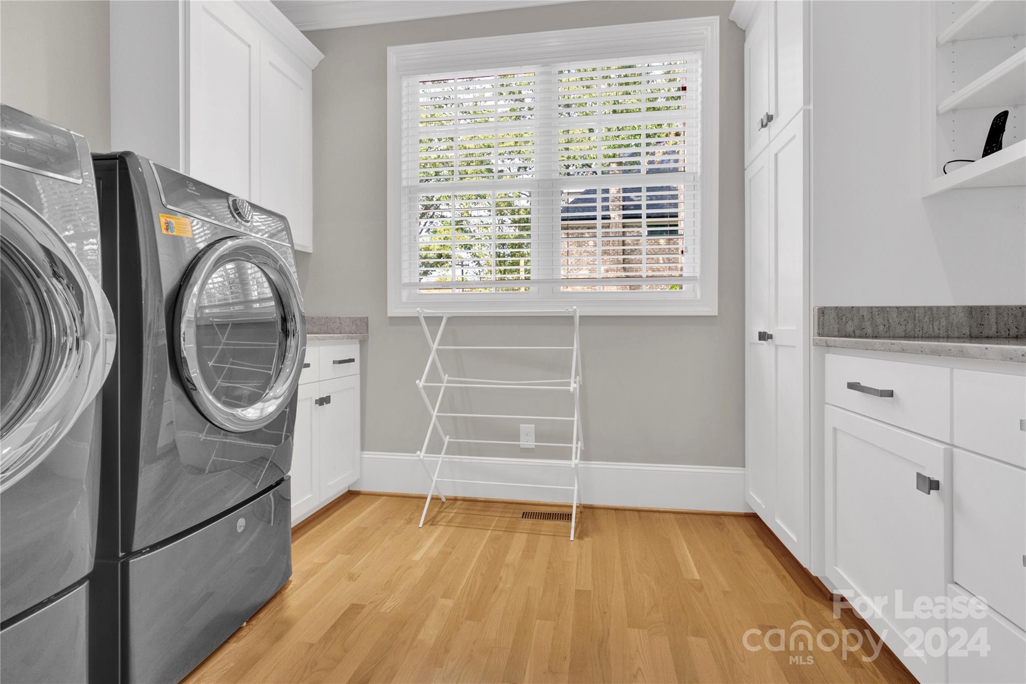 3012 Sharon View Road Charlotte, NC 28210 - Photo 9 of 48 a view of walk in closet with clothes and shoes
