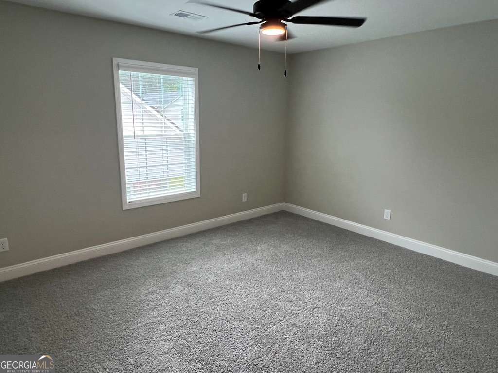 405 Madison Avenue St. Marys, GA 31558 - Photo 15 of 21 an empty room with a window