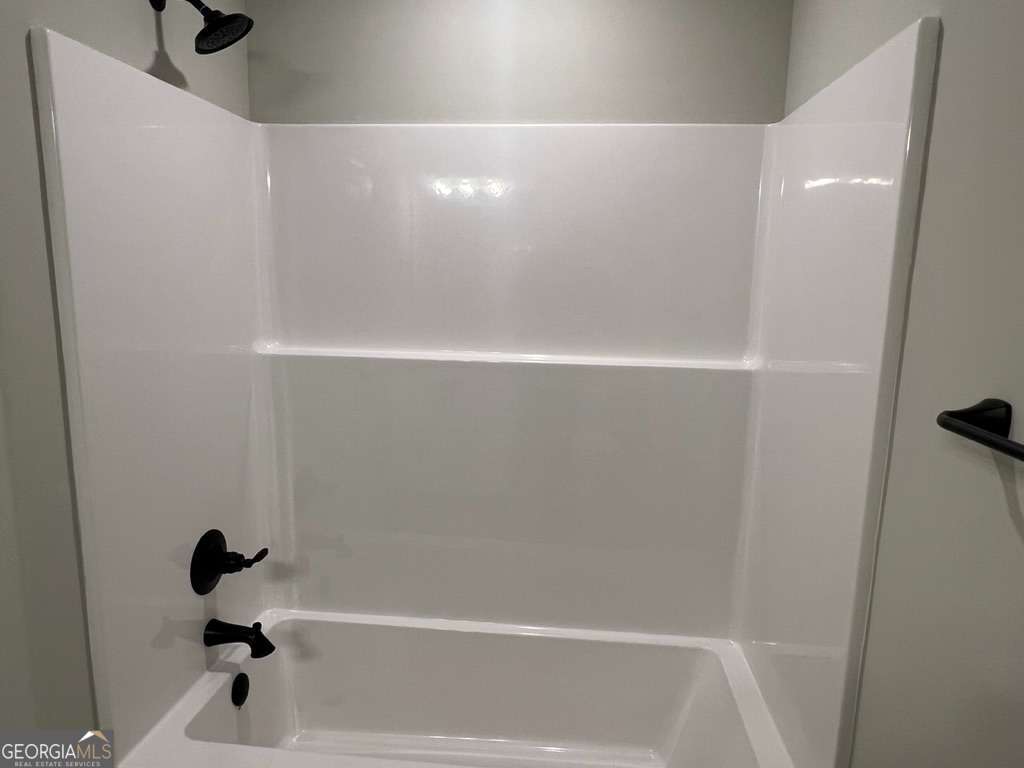 405 Madison Avenue St. Marys, GA 31558 - Photo 8 of 21 a bathroom with a bathtub