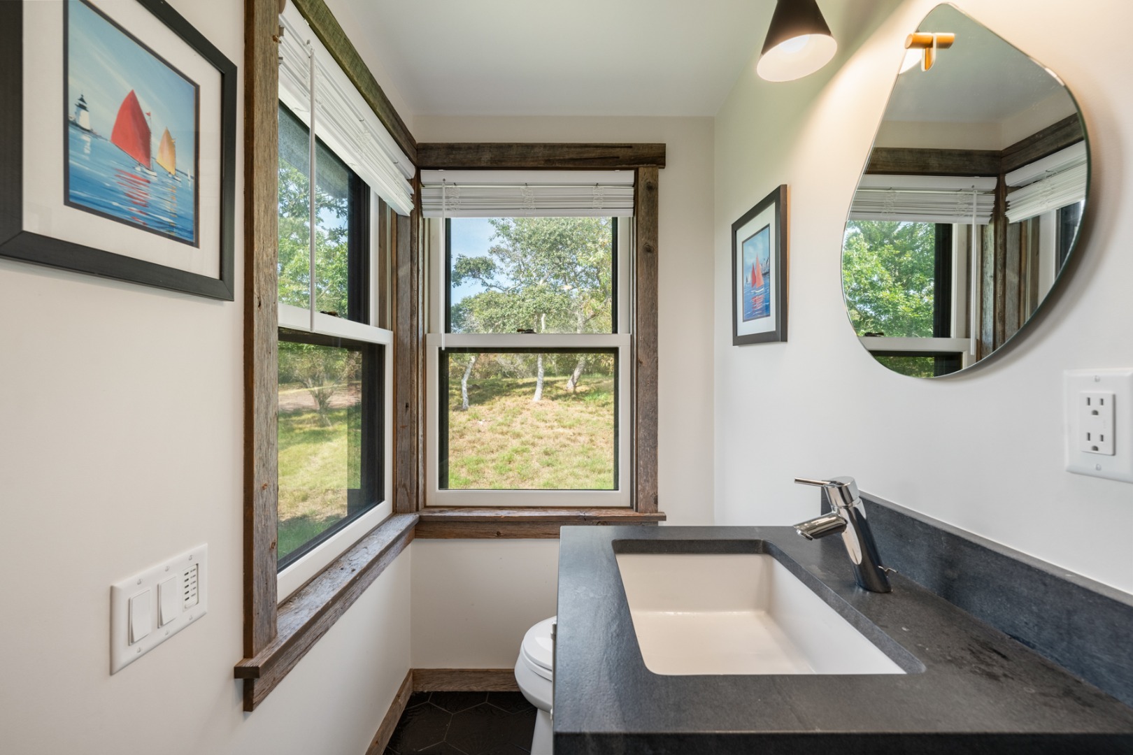 247 Polpis Road Nantucket, MA 02554 - Photo 48 of 52 a bathroom with a sink and a large window